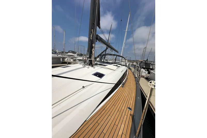  Yacht Photos Pics 2018 Jeanneau 54 yacht docked, showcasing sleek deck design and modern features.