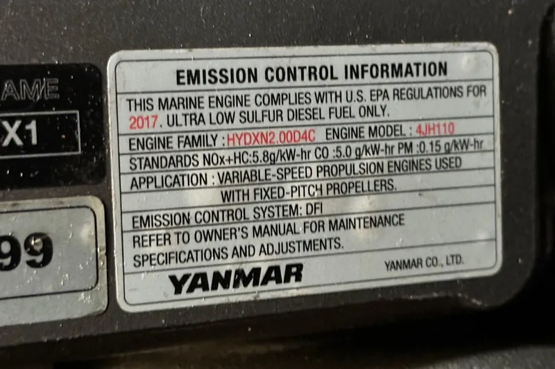  Yacht Photos Pics Emission control label on a 2018 Jeanneau 54 marine engine by Yanmar.