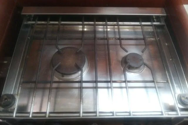 Pacifico Yacht Photos Pics Stainless steel stove with two burners on a 2005 Beneteau 393 yacht.