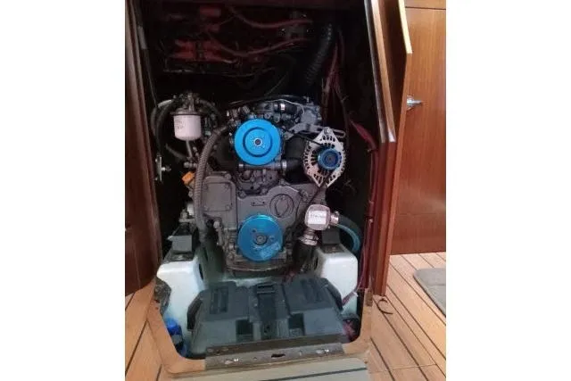 Pacifico Yacht Photos Pics Engine compartment of a 2005 Beneteau 393 sailboat, showcasing mechanical components.