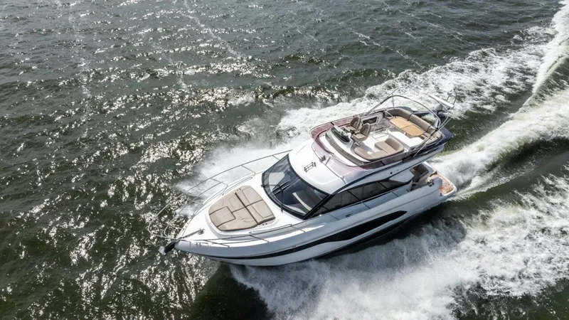  Yacht Photos Pics 2019 Princess F45 yacht cruising on open water, showcasing sleek design and luxury features.