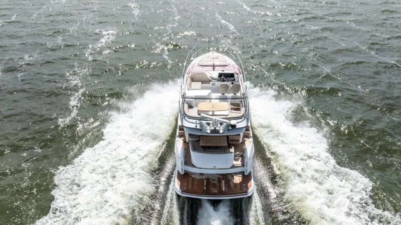  Yacht Photos Pics 2019 Princess F45 yacht cruising on open water, aerial view.