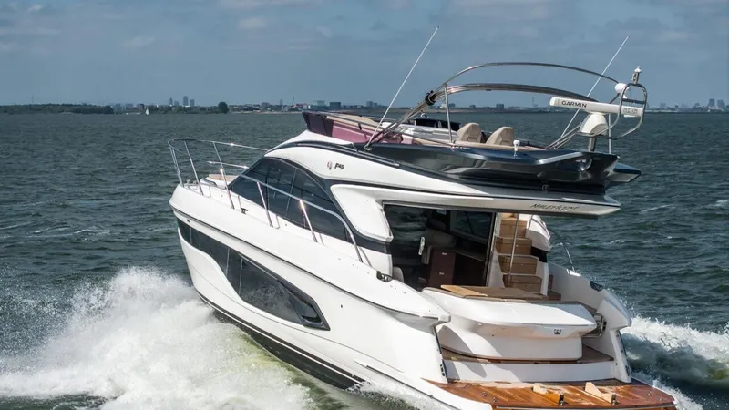 Yacht Photos Pics 2019 Princess F45 yacht cruising on open water, showcasing sleek design and luxury features.