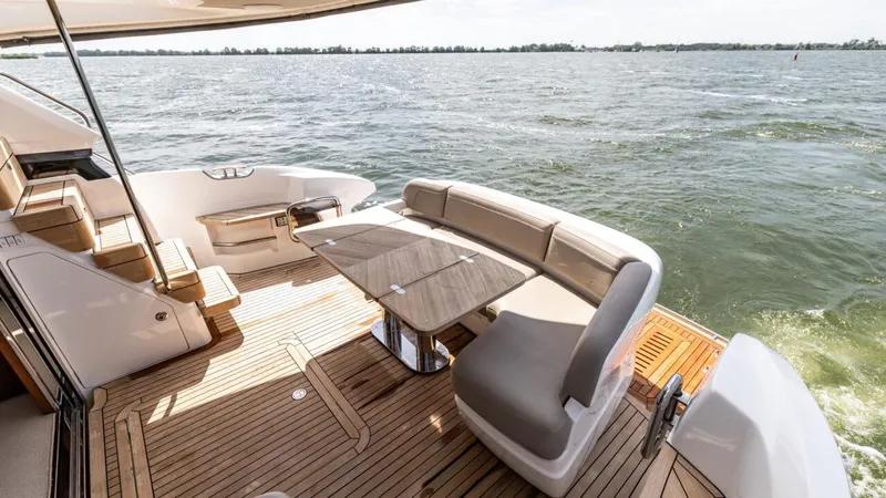  Yacht Photos Pics Luxurious 2019 Princess F45 yacht deck with seating and ocean view.