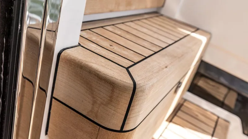  Yacht Photos Pics Wooden deck detail on 2019 Princess F45 yacht, showcasing sleek design and craftsmanship.