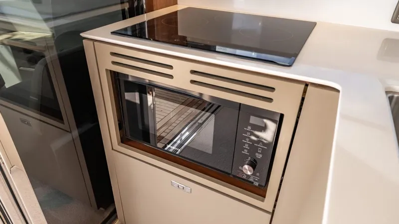  Yacht Photos Pics Modern kitchen appliance on 2019 Princess F45 yacht, featuring a sleek built-in microwave.