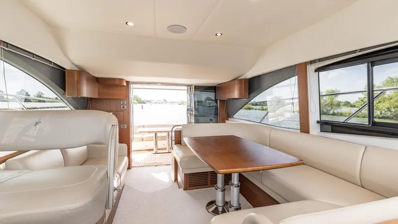  Yacht Photos Pics Luxurious interior of 2019 Princess F45 yacht with elegant seating and dining area.
