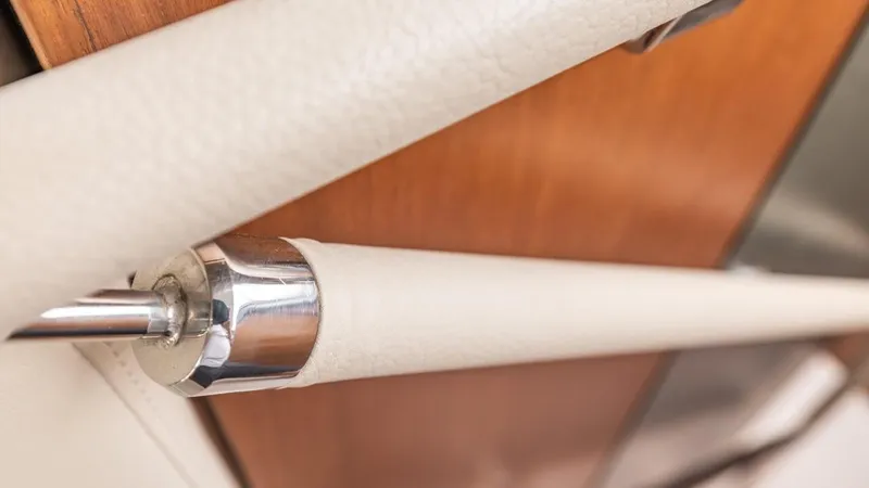  Yacht Photos Pics Close-up of a 2019 Princess F45 yacht interior detail with leather and wood finish.