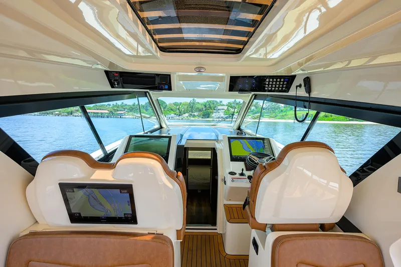 53 Scout Yacht Photos Pics Interior view of 2021 Scout 530 LXF yacht cockpit with advanced navigation systems.