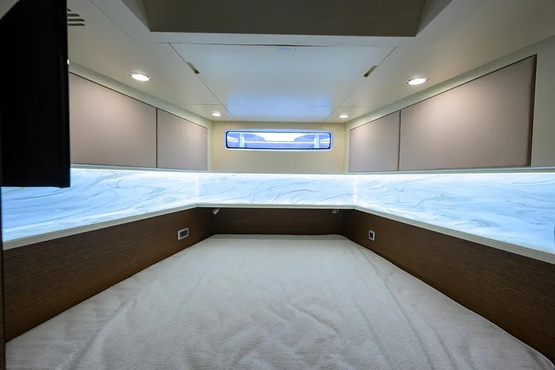 53 Scout Yacht Photos Pics Luxurious interior cabin of 2021 Scout 530 LXF boat, featuring ambient lighting and modern design.