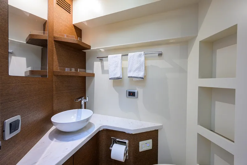 53 Scout Yacht Photos Pics Luxurious bathroom interior of 2021 Scout 530 LXF yacht with modern fixtures and elegant design.