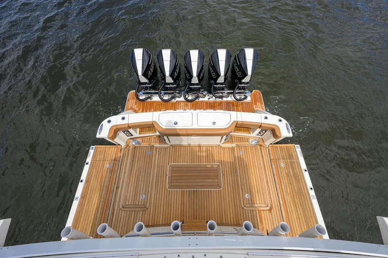 53 Scout Yacht Photos Pics 2021 Scout 530 LXF boat with quad engines and teak deck, viewed from above.