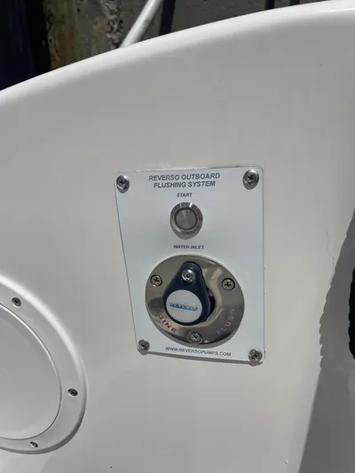  Yacht Photos Pics 2023 Pursuit DC 365 Dual Console Reverso outboard flushing system control panel.