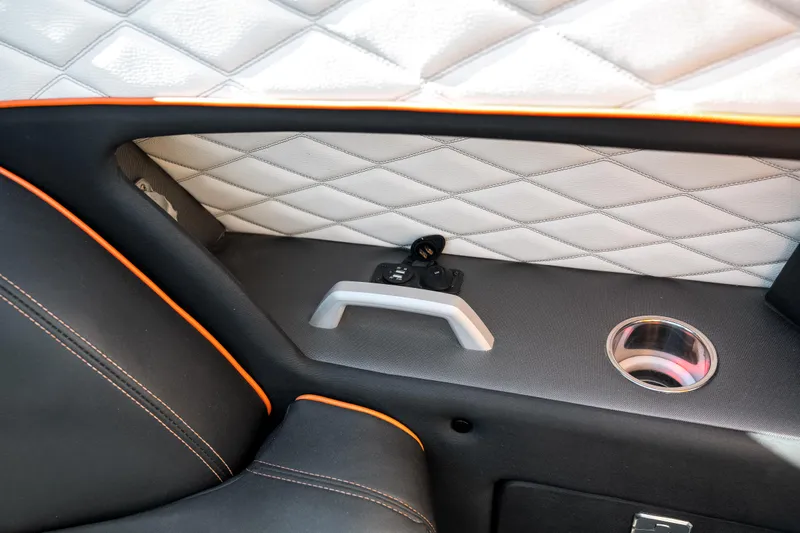  Yacht Photos Pics Interior of 2020 Fountain 47 Lightning boat with quilted paneling and cup holder.