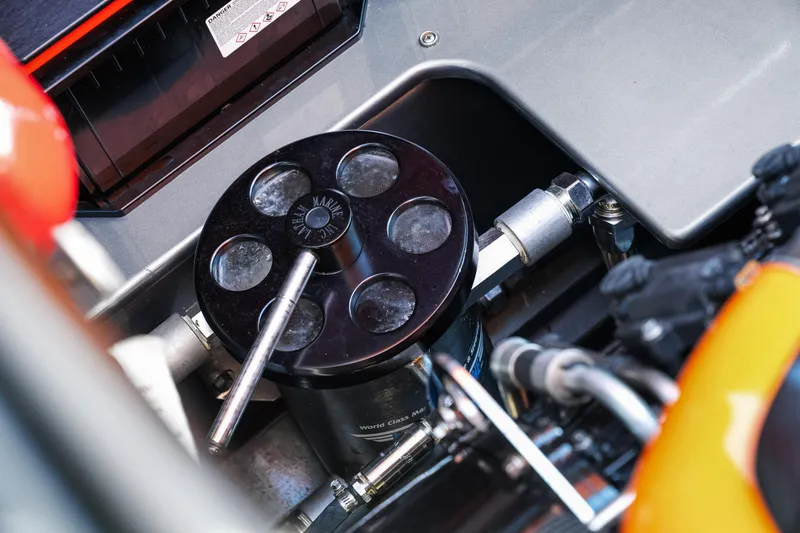  Yacht Photos Pics Close-up of 2020 Fountain 47 Lightning engine components, showcasing mechanical details and connections.