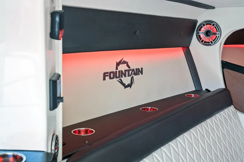  Yacht Photos Pics Interior of 2020 Fountain 47 Lightning boat with red ambient lighting and logo.