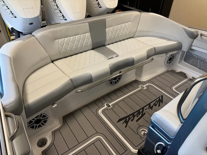  Yacht Photos Pics 2024 Nor-Tech 390 Sport Center Console with luxurious seating and sleek design.
