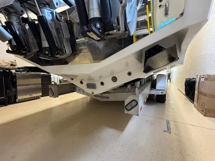  Yacht Photos Pics 2024 Nor-Tech 390 Sport Center Console on trailer, showcasing powerful outboard engines.