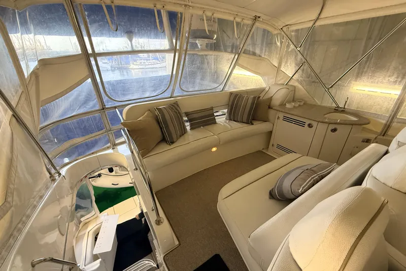 Bellissimo Yacht Photos Pics Interior of 2006 Silverton 38 Sport Bridge yacht with plush seating and elegant design.