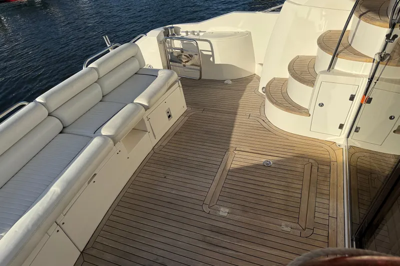 Seaya II Yacht Photos Pics Luxurious 2008 Sunseeker Manhattan 50 yacht deck with elegant seating and wooden flooring.