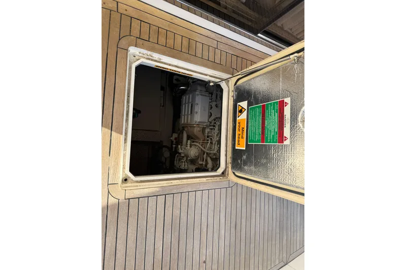 Seaya II Yacht Photos Pics Engine compartment of 2008 Sunseeker Manhattan 50 yacht with open hatch.