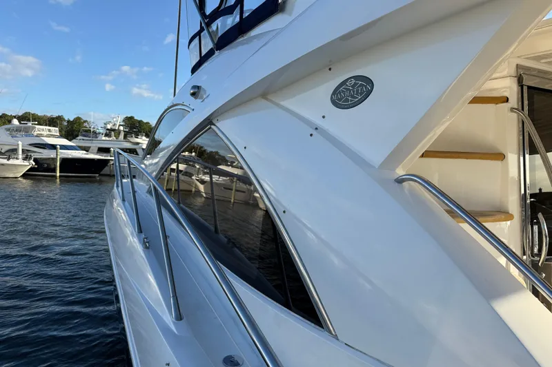 Seaya II Yacht Photos Pics 2008 Sunseeker Manhattan 50 yacht docked at marina, showcasing sleek design and luxury features.