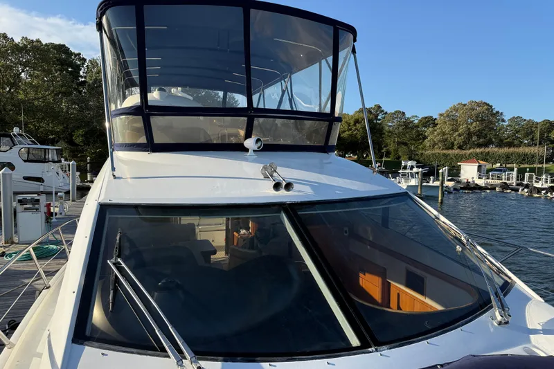 Seaya II Yacht Photos Pics 2008 Sunseeker Manhattan 50 yacht docked at marina, showcasing sleek design and spacious flybridge.