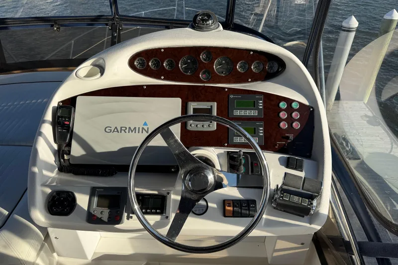 Seaya II Yacht Photos Pics 2008 Sunseeker Manhattan 50 yacht helm with Garmin navigation system and control panel.