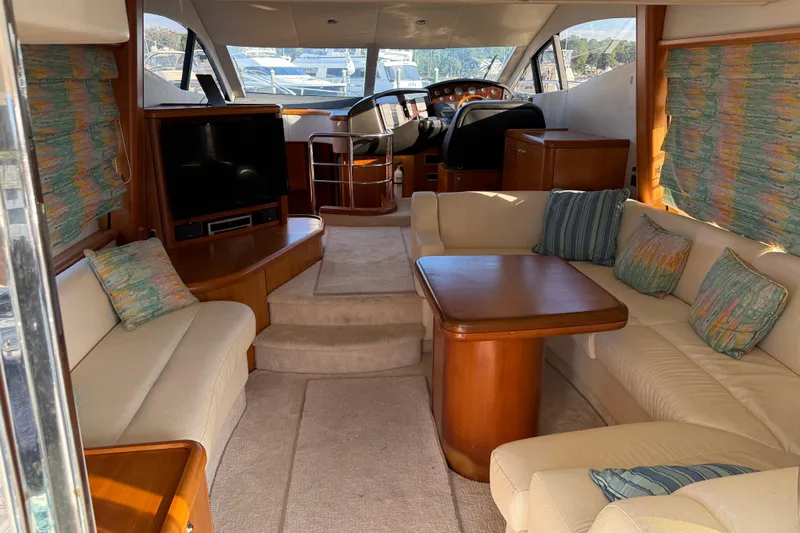 Seaya II Yacht Photos Pics Luxurious interior of 2008 Sunseeker Manhattan 50 yacht with plush seating and elegant decor.