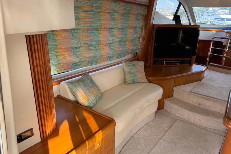 Seaya II Yacht Photos Pics Luxurious 2008 Sunseeker Manhattan 50 yacht interior with cozy seating and entertainment area.