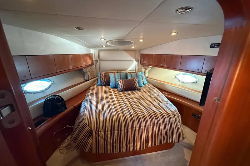 Seaya II Yacht Photos Pics Luxurious cabin interior of 2008 Sunseeker Manhattan 50 yacht with elegant bedding.