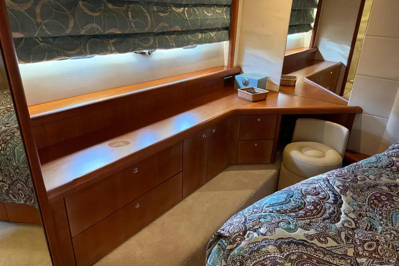 Seaya II Yacht Photos Pics Luxurious cabin interior of 2008 Sunseeker Manhattan 50 yacht with elegant wood finish.