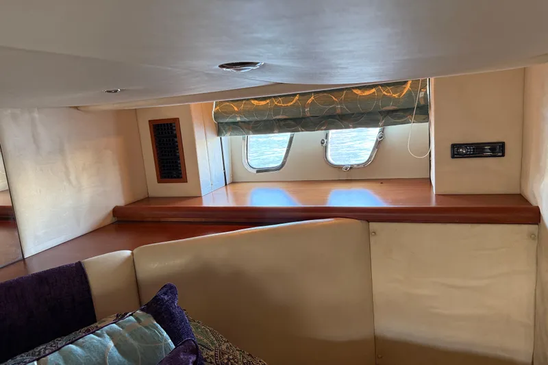 Seaya II Yacht Photos Pics Interior of 2008 Sunseeker Manhattan 50 yacht, featuring cozy seating and ocean view windows.