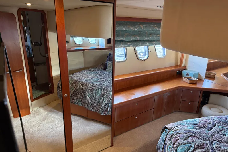 Seaya II Yacht Photos Pics Luxurious cabin interior of 2008 Sunseeker Manhattan 50 yacht with elegant wood finishes.