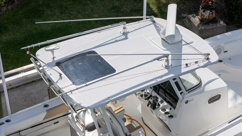 Dan's Seachelle Yacht Photos Pics 2019 Edgewater 320CC boat, aerial view of helm and T-top design.