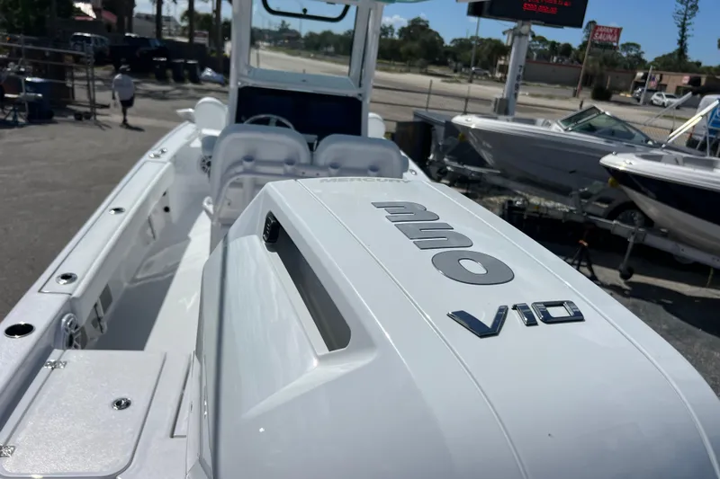  Yacht Photos Pics 2026 Sportsman Masters 247 Bay Boat with powerful V10 engine, displayed outdoors.