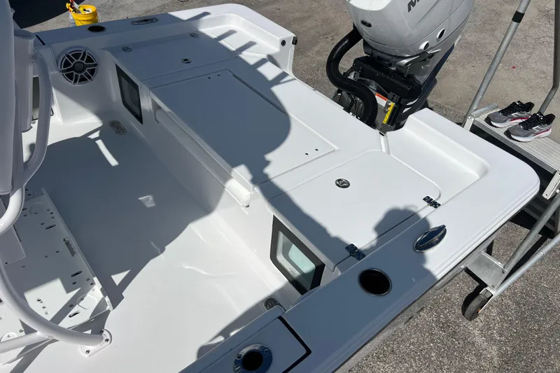  Yacht Photos Pics 2026 Sportsman Masters 247 Bay Boat deck with motor and accessories.