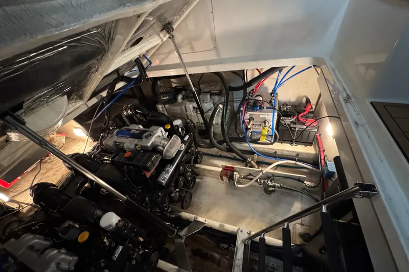  Yacht Photos Pics Engine room of a 2011 Sea Ray 370 Sundancer with visible machinery and wiring.