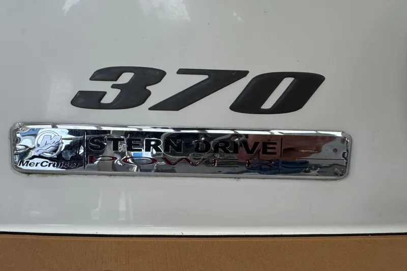  Yacht Photos Pics Sea Ray 370 Sundancer 2011 stern drive emblem with MerCruiser logo.