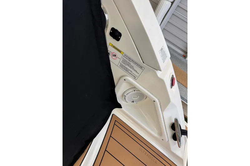  Yacht Photos Pics Sea Ray 370 Sundancer 2011 boat interior with speaker and warning label.