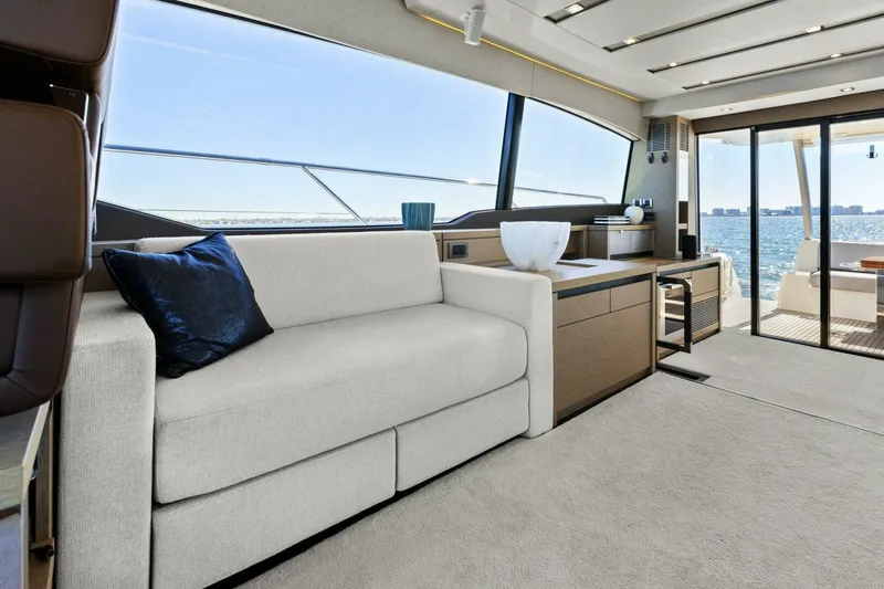 Radiant Yacht Photos Pics Luxurious interior of 2019 Prestige 630 Flybridge yacht with ocean view.