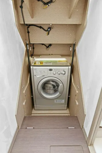 Radiant Yacht Photos Pics Washing machine in 2019 Prestige 630 Flybridge yacht interior compartment.