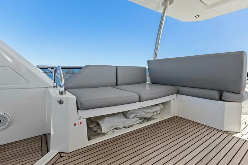 Radiant Yacht Photos Pics Prestige 630 Flybridge 2019 yacht with sleek seating and teak deck.