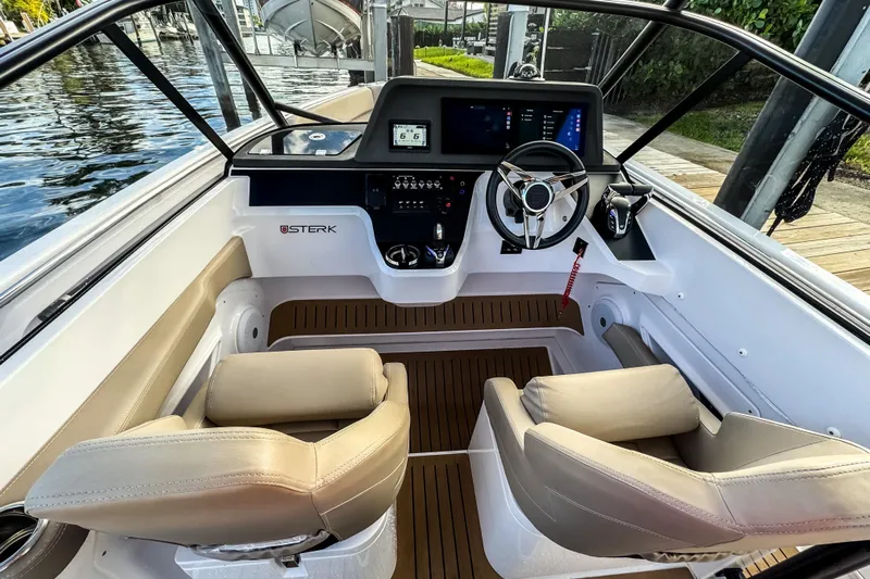  Yacht Photos Pics Interior of STERK 31 boat, 2025 model, featuring modern helm console.