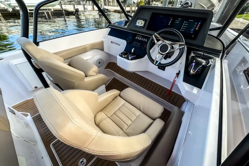  Yacht Photos Pics Interior of STERK 31 boat, 2025 model, featuring modern helm console.