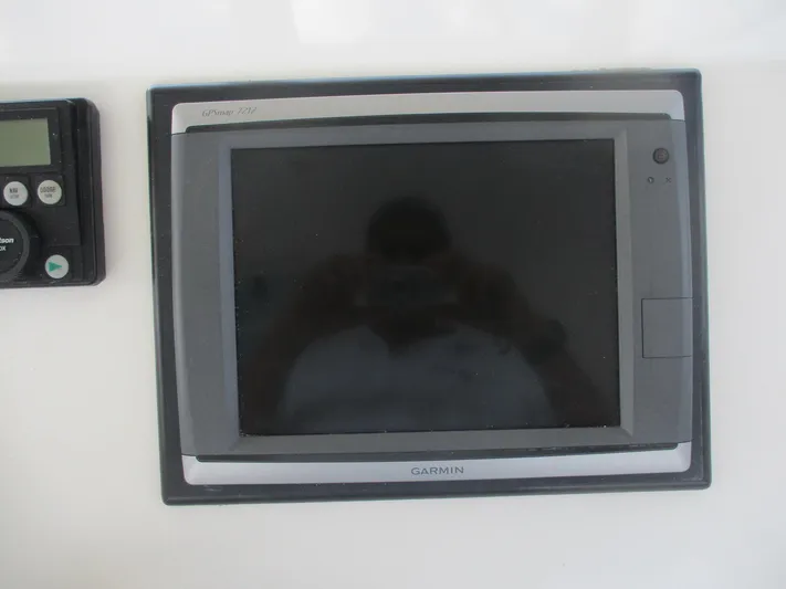 Persian Lady Yacht Photos Pics Garmin marine GPS device on 1997 Ocean Yachts 40 Super Sport dashboard.