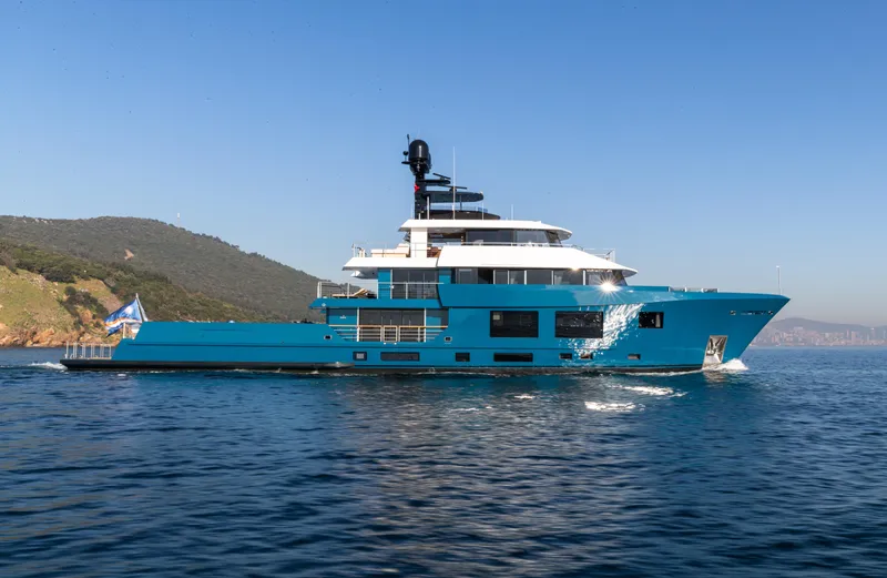 King Benji Yacht Photos Pics Luxurious 2024 Dunya Yachts model cruising on serene blue waters.