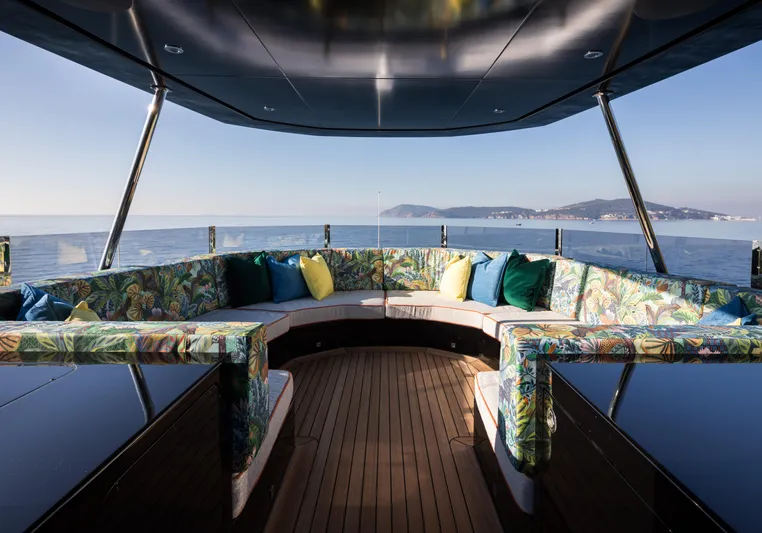 King Benji Yacht Photos Pics Luxurious 2024 Dunya Yachts interior with elegant seating and ocean view.