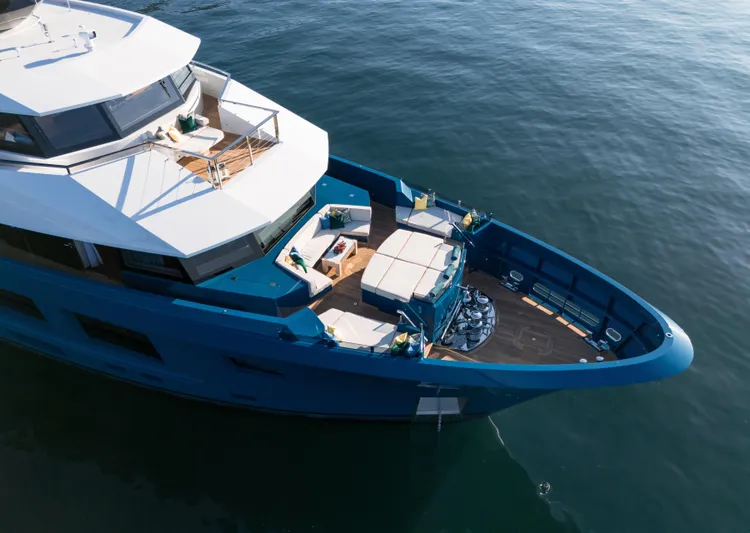 King Benji Yacht Photos Pics Luxurious 2024 Dunya Yacht with spacious deck, elegant design, and modern amenities on calm waters.