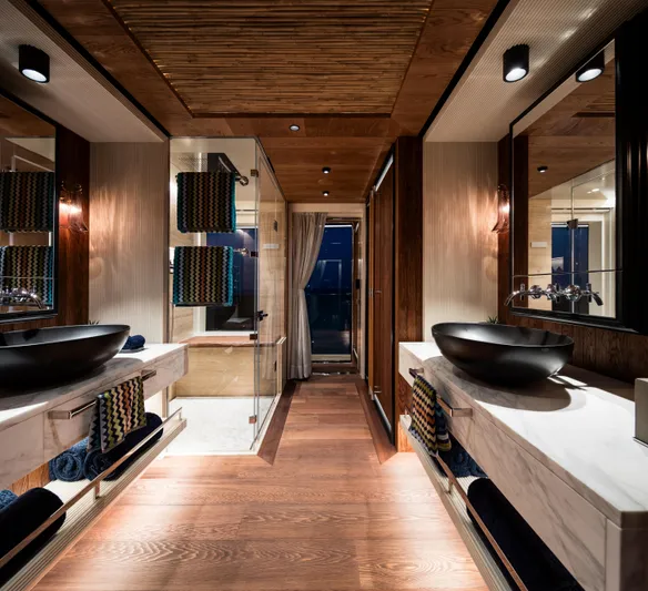 King Benji Yacht Photos Pics Luxurious bathroom interior on 2024 Dunya Yachts, featuring modern design and elegant fixtures.